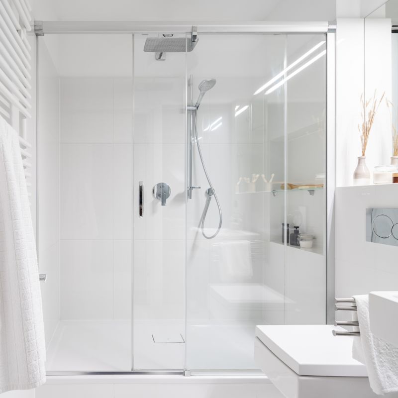 Shower with Clear Glass Door and LED Lighting